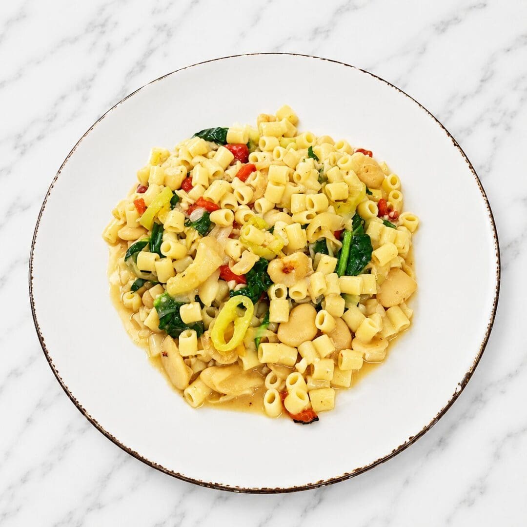 Plate of ditalini pasta with vegetables